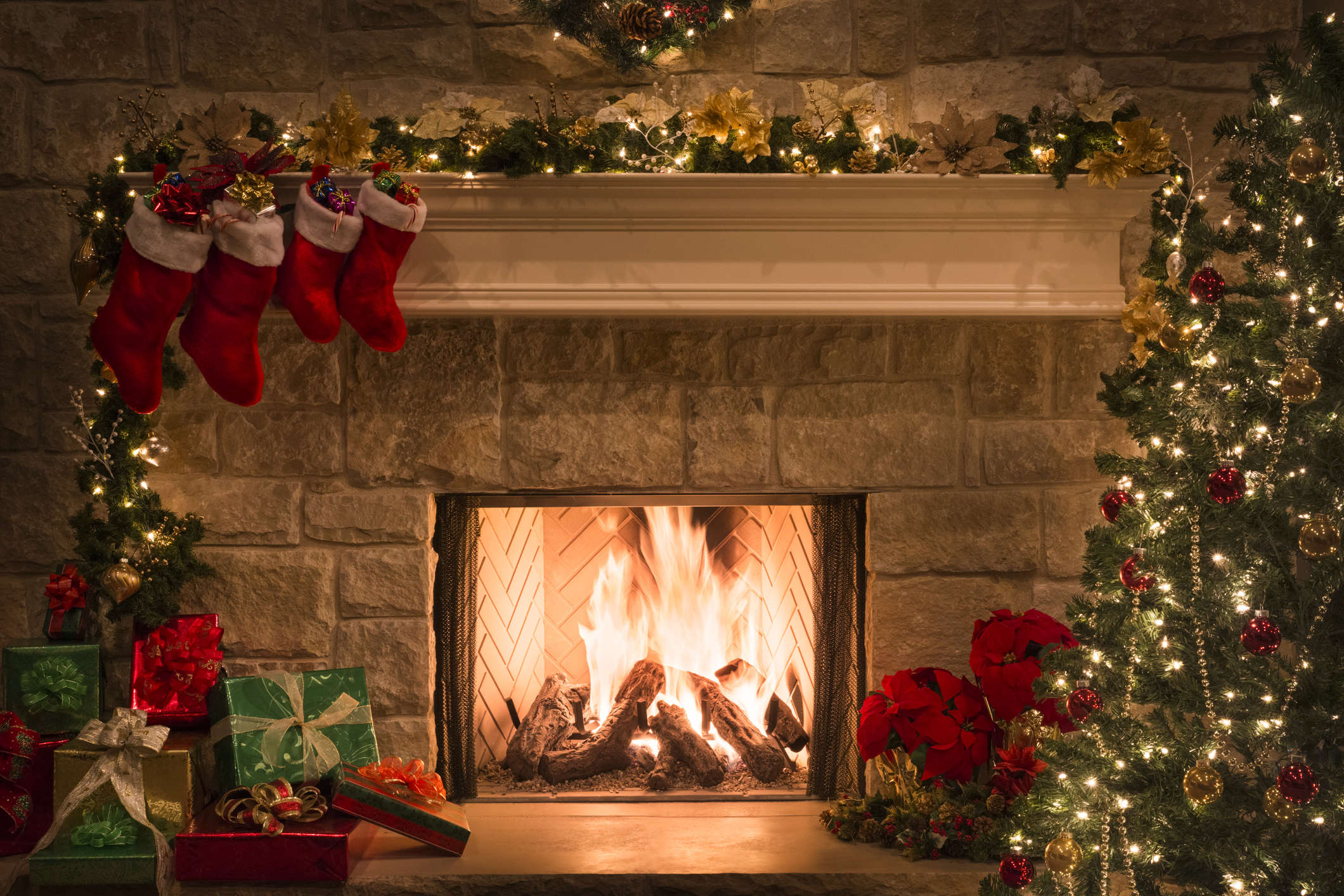Christmas fireplace, stockings, gifts, tree, copy space - Lisa Lisson ...